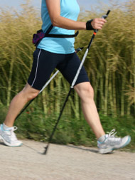 woman walking with walking pole